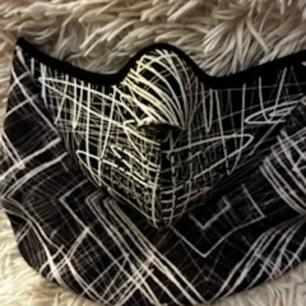 Black & white Face Mask for outdoor protection while skiing or riding.